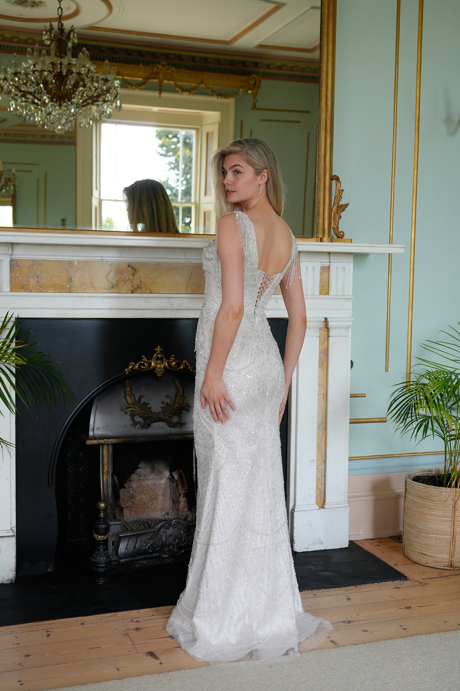 Virelle Crystal-Embellished Mermaid Evening Gown in Ivory — elegant back view showing the gown structure