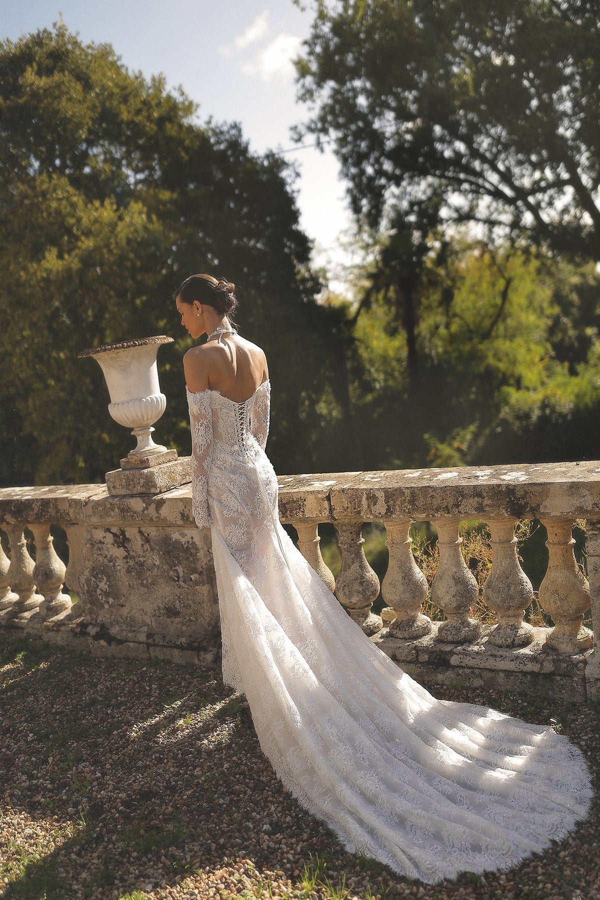Encore by Maison Harleen couture gown — side profile displaying the fabric drape