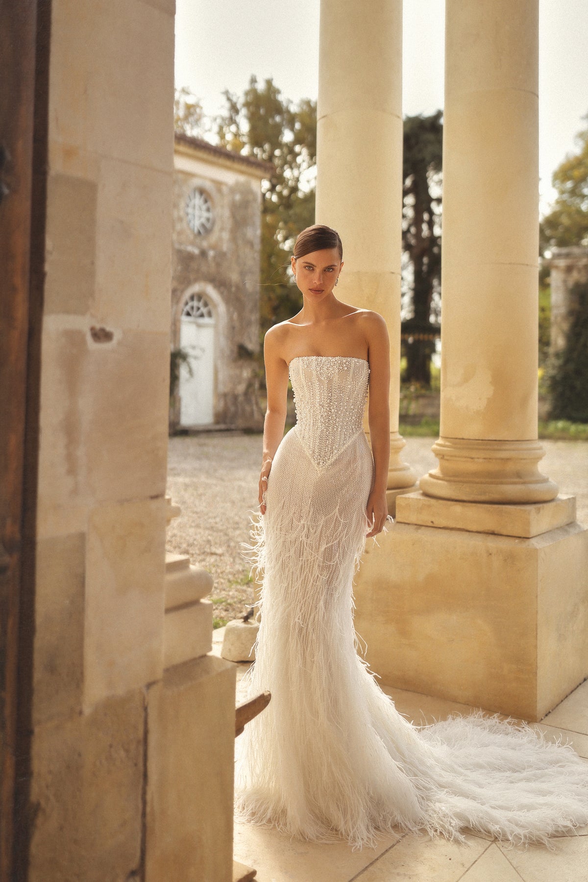 Hollywood by Maison Harleen couture gown — elegant back view showing the gown structure