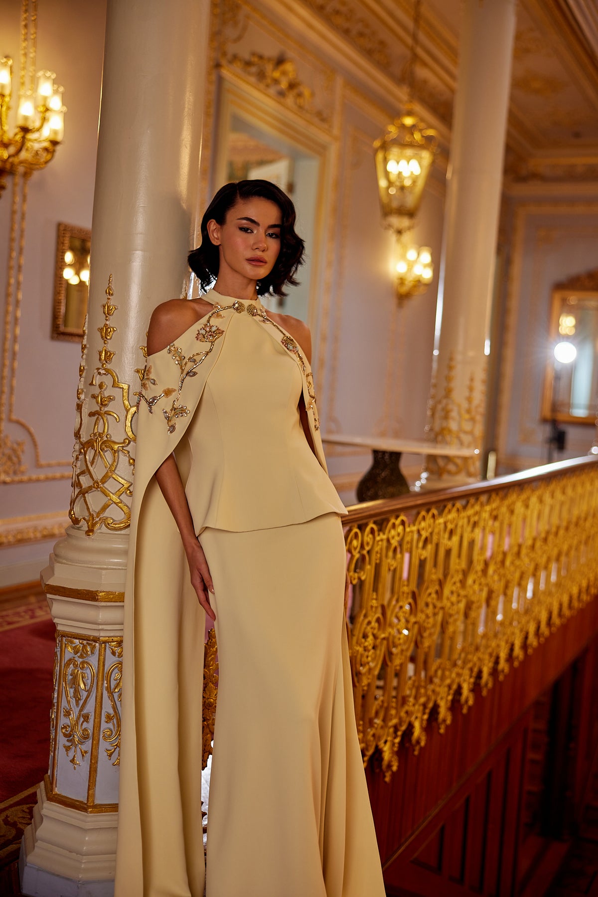 Arabic style couture evening gown with intricate embellishments and elegant structure