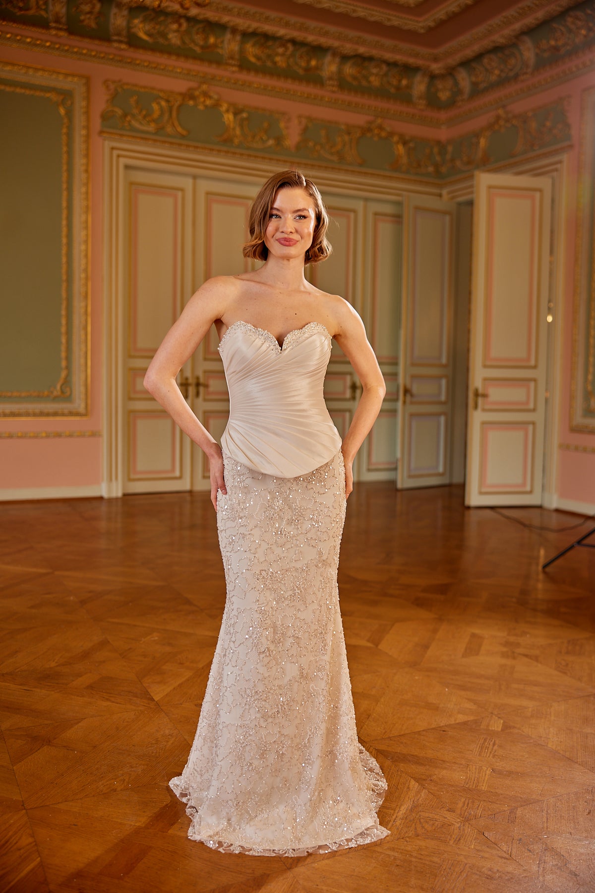 Beaded lace evening gown with elegant couture craftsmanship and fitted shape