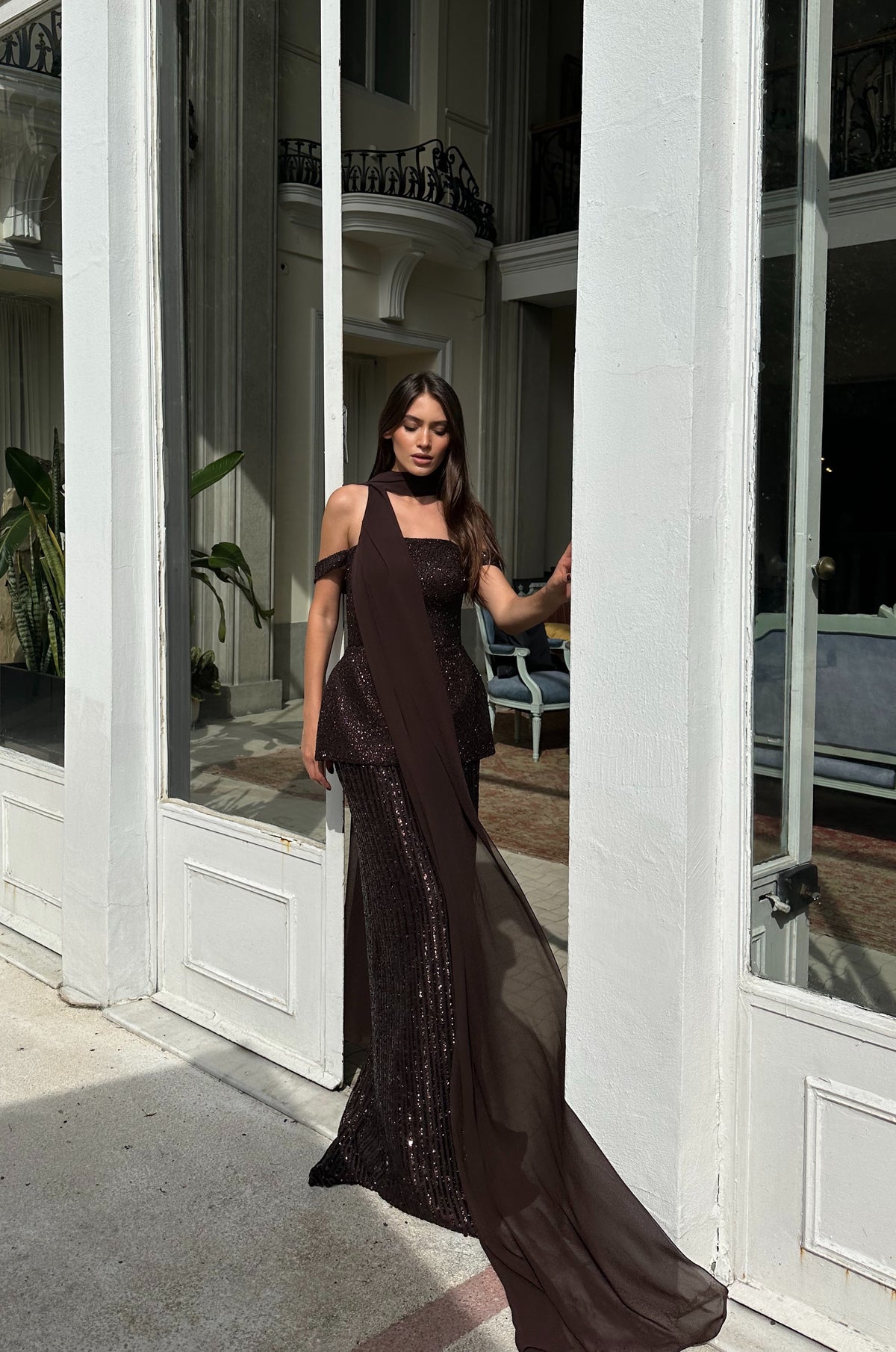 Luxury chocolate brown evening dress featuring shimmering sequins and off-shoulder neckline
