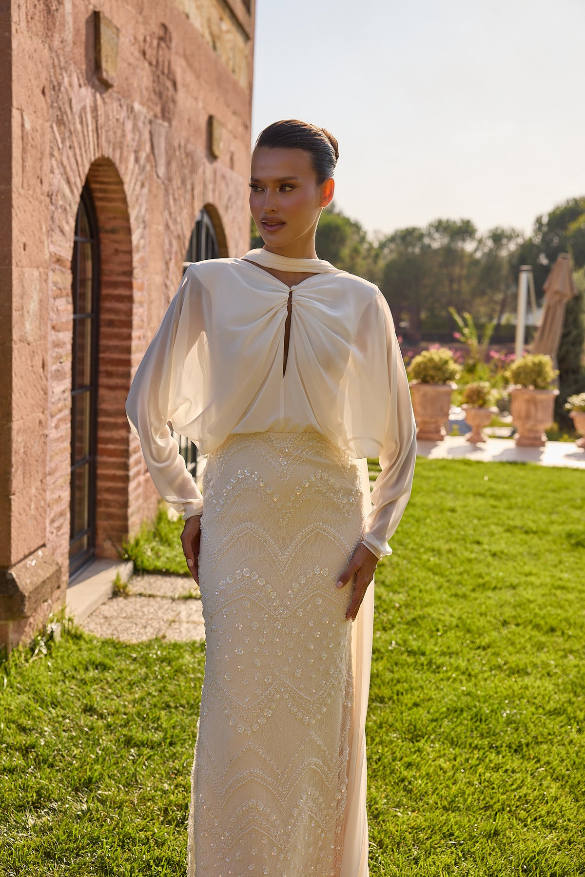 Serenelle Ivory Draped Cape Embellished Gown