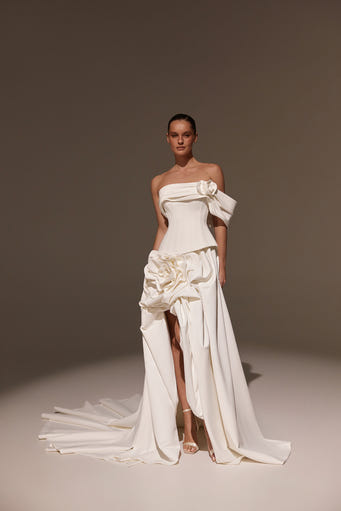 Nola strapless corset bridal gown with floral-inspired draping