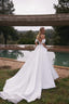 Cooper Mikado A-line bridal gown with draped bodice and hidden pockets