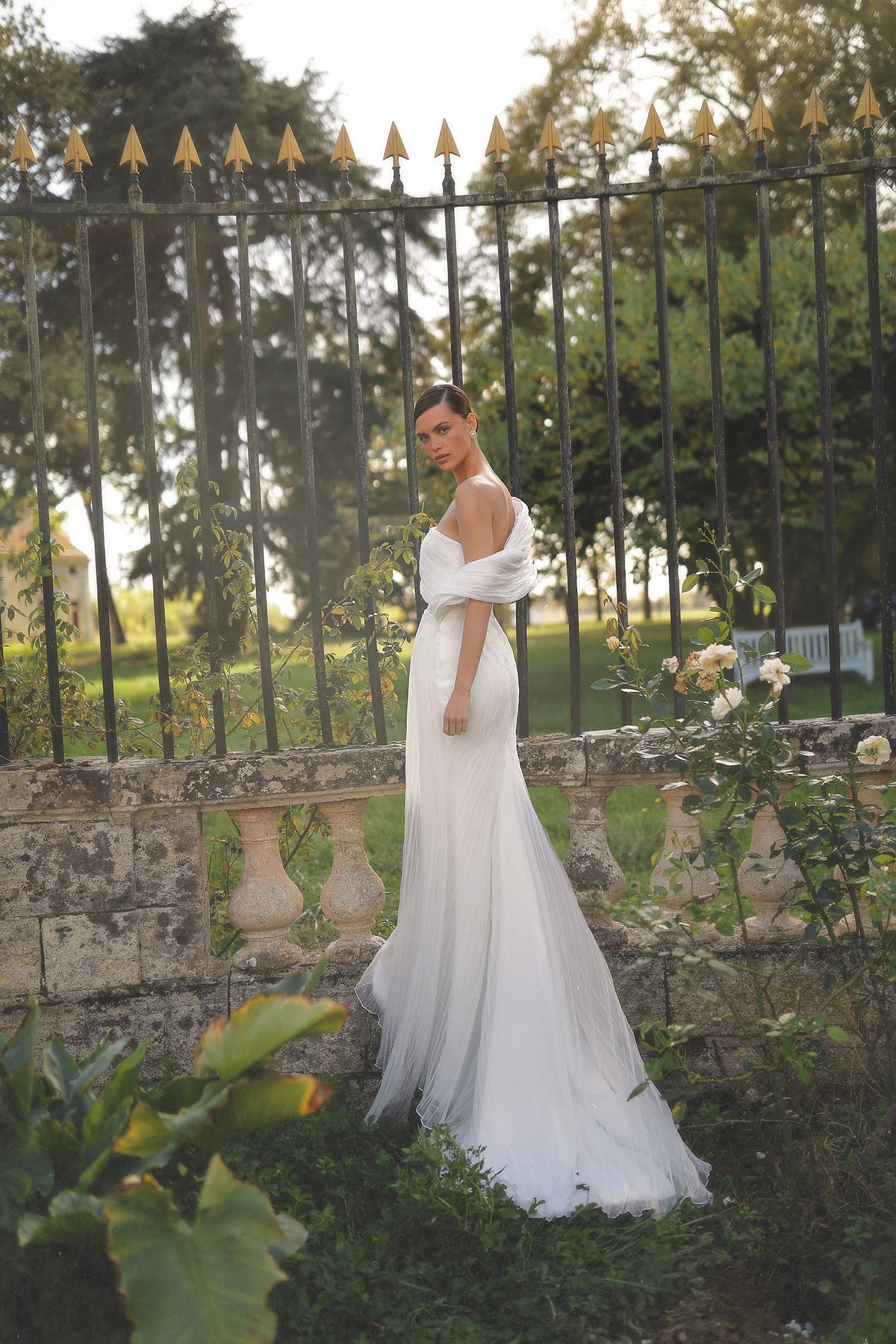 Diamee by Maison Harleen couture gown — elegant back view showing the gown structure