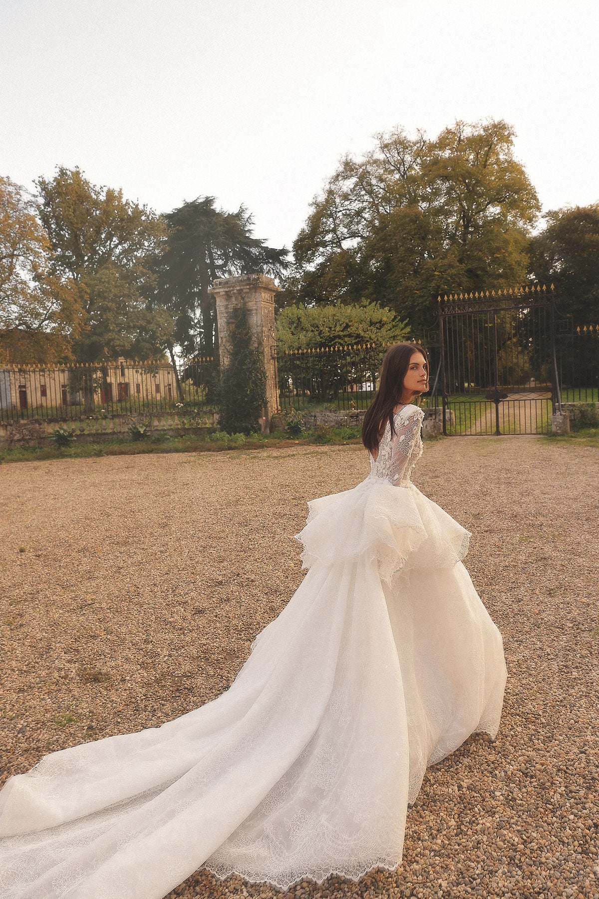 Grandis by Maison Harleen couture gown — elegant back view showing the gown structure