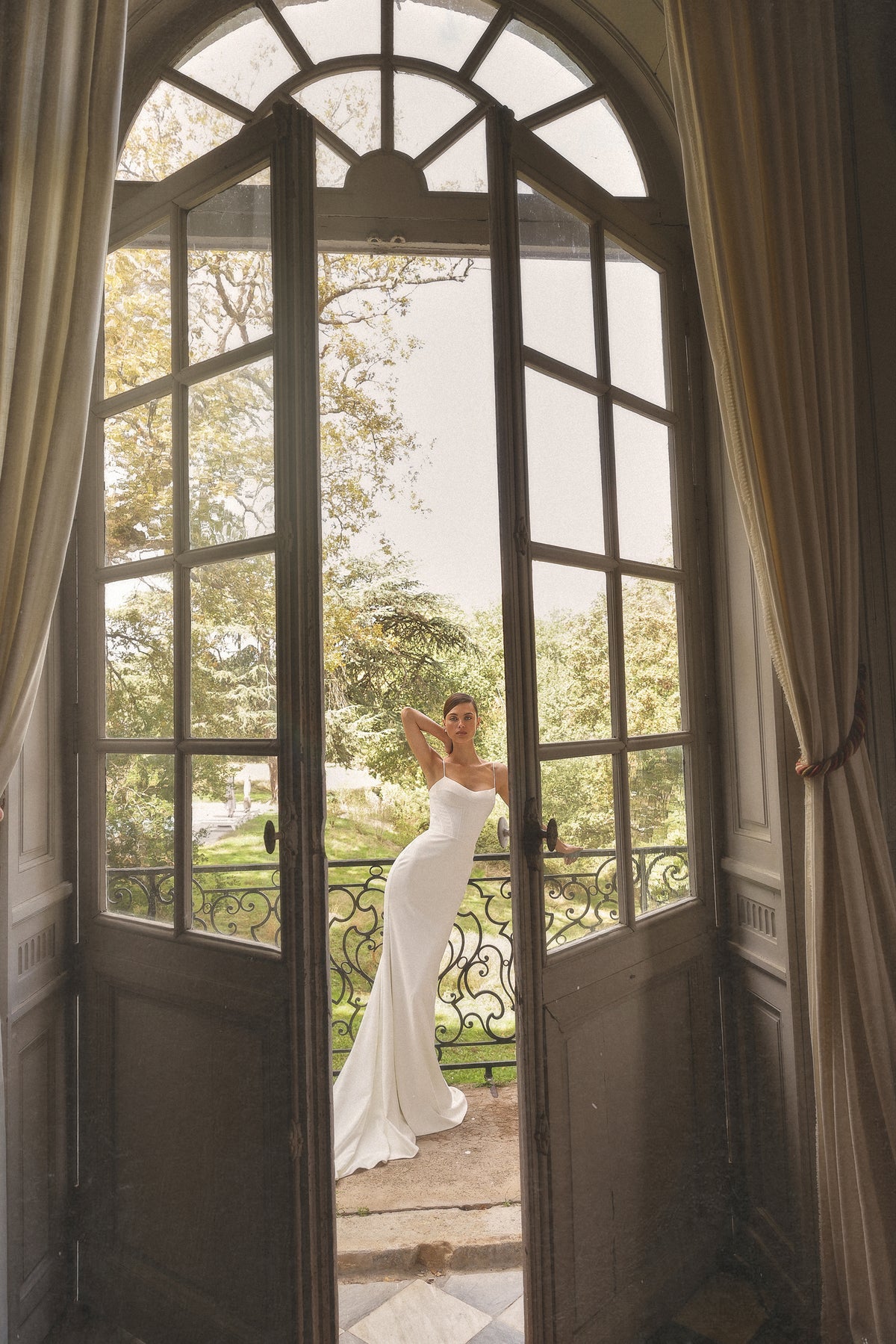Max by Maison Harleen couture gown — elegant back view showing the gown structure