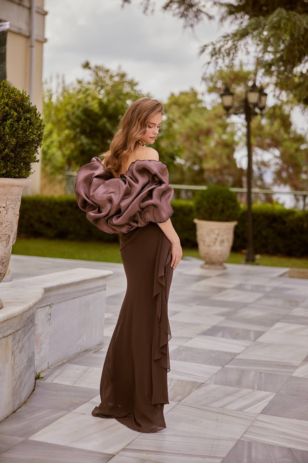 Cassia Chocolate Brown Ruched Halter Couture Evening Gown — three-quarter view highlighting the bodice details