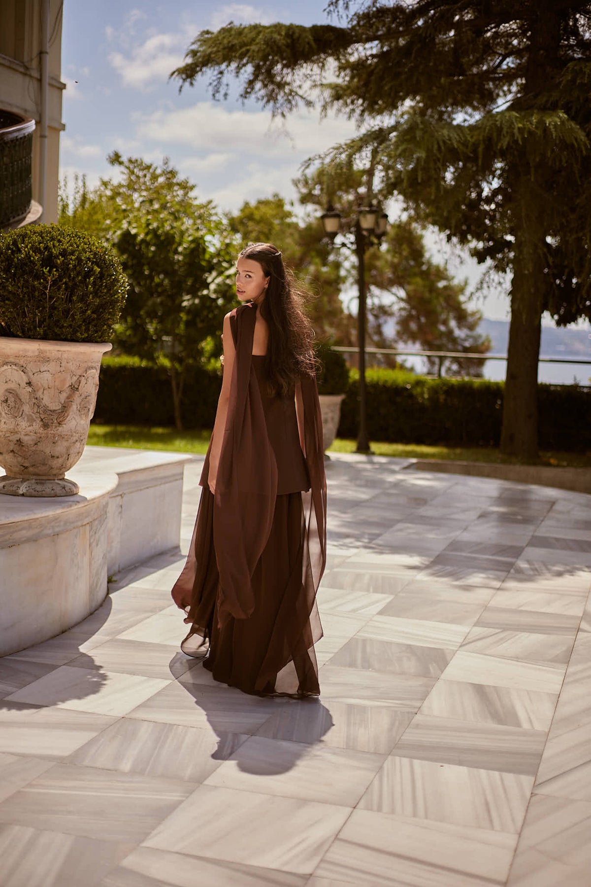 Oriana Chocolate Brown Floral Appliqué Couture Evening Set — side profile displaying the fabric drape
