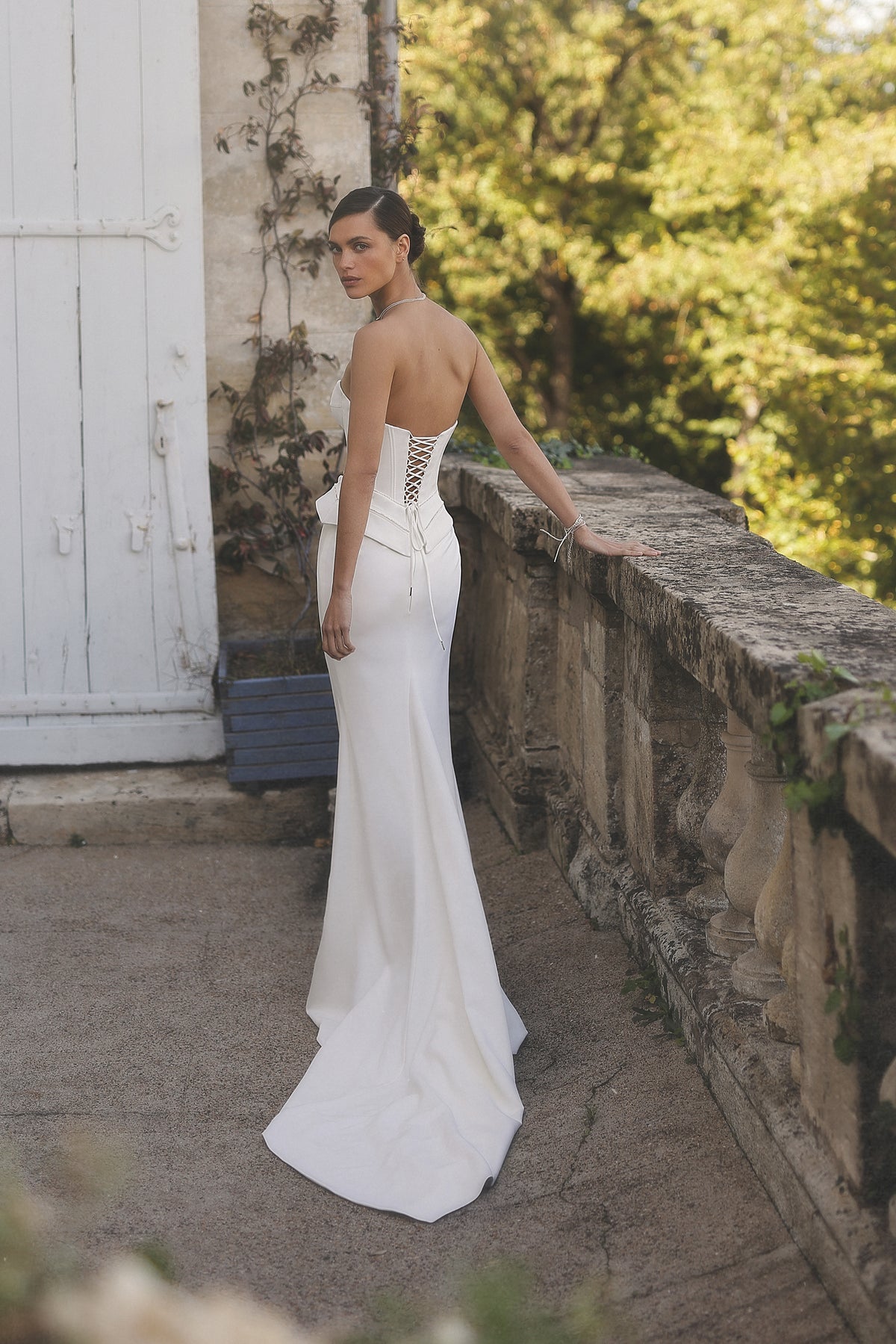 Rikke by Maison Harleen couture gown — elegant back view showing the gown structure