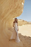 Yuma lace bridal gown with a structured off-shoulder draped overlay