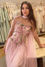 Model wearing Clara blush pink floral couture gown with romantic feminine silhouette