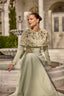 Couture inspired maxi dress designed with embellished details and statement cape styling