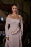 Model wearing Dixie off-shoulder modest evening gown with floral embellishments and elegant silhouette