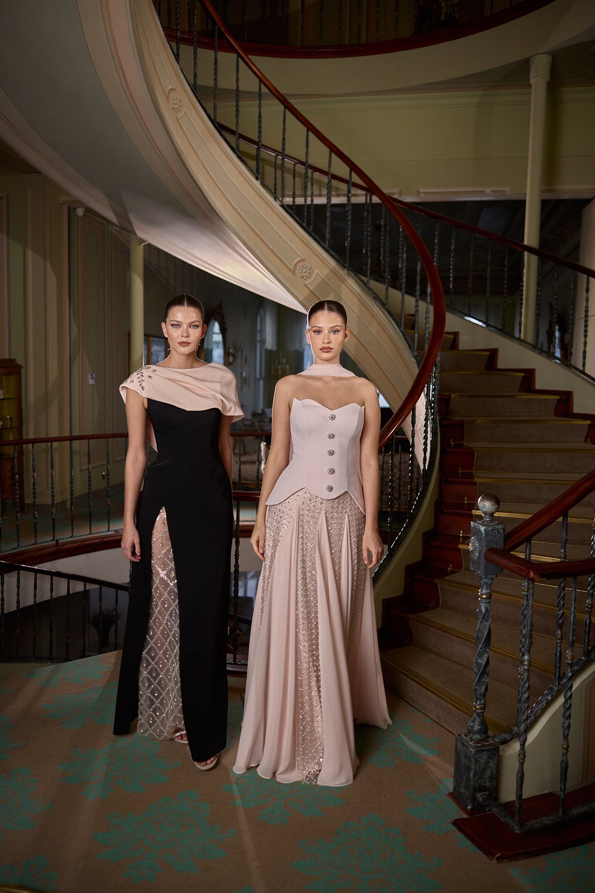 Elegant black evening dress with high slit and refined couture design