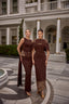 Luxury formal dress featuring minimal design and delicate embellishment details