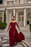 Luxury strapless satin gown featuring scarf neckline detail and fitted bodice