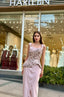 Model wearing Kalila embellished peplum couture evening gown with elegant structured silhouette