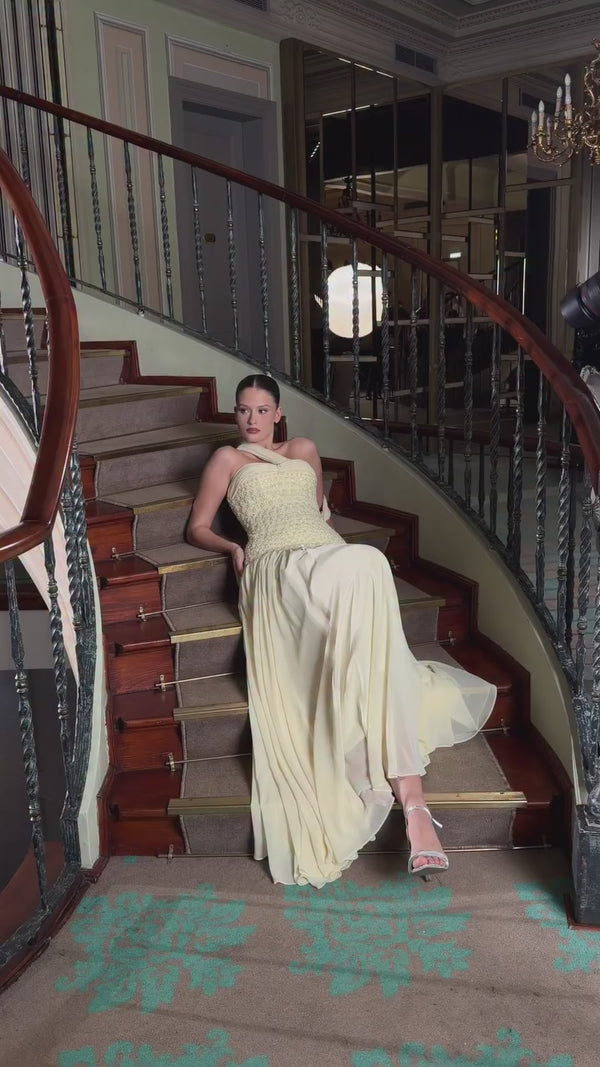 One shoulder champagne satin evening dress with soft draping and elegant structure