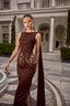 Model wearing Quinn embellished minimal evening gown with sculpted silhouette and elegant finish