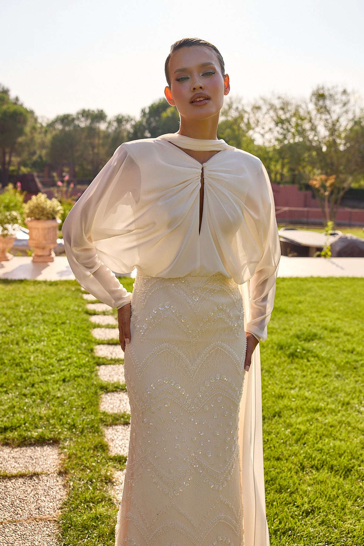 Serenelle Ivory Draped Cape Embellished Gown