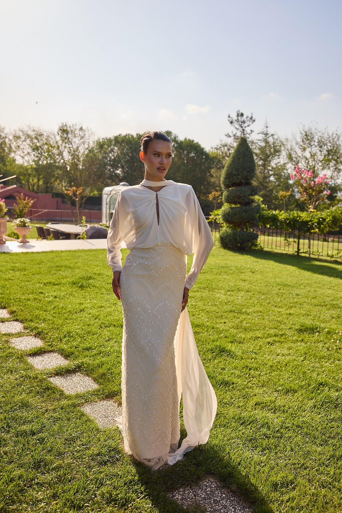 Serenelle Ivory Draped Cape Embellished Gown