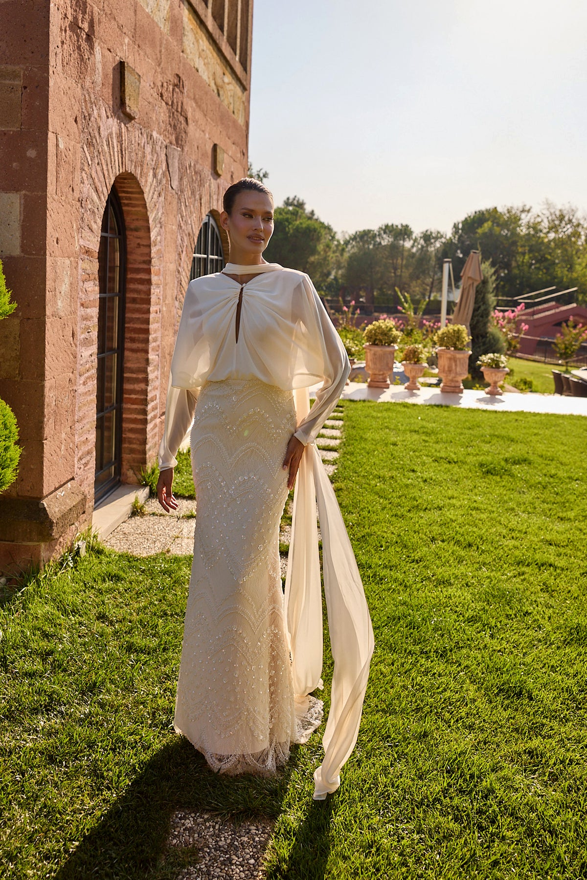 Serenelle Ivory Draped Cape Embellished Gown