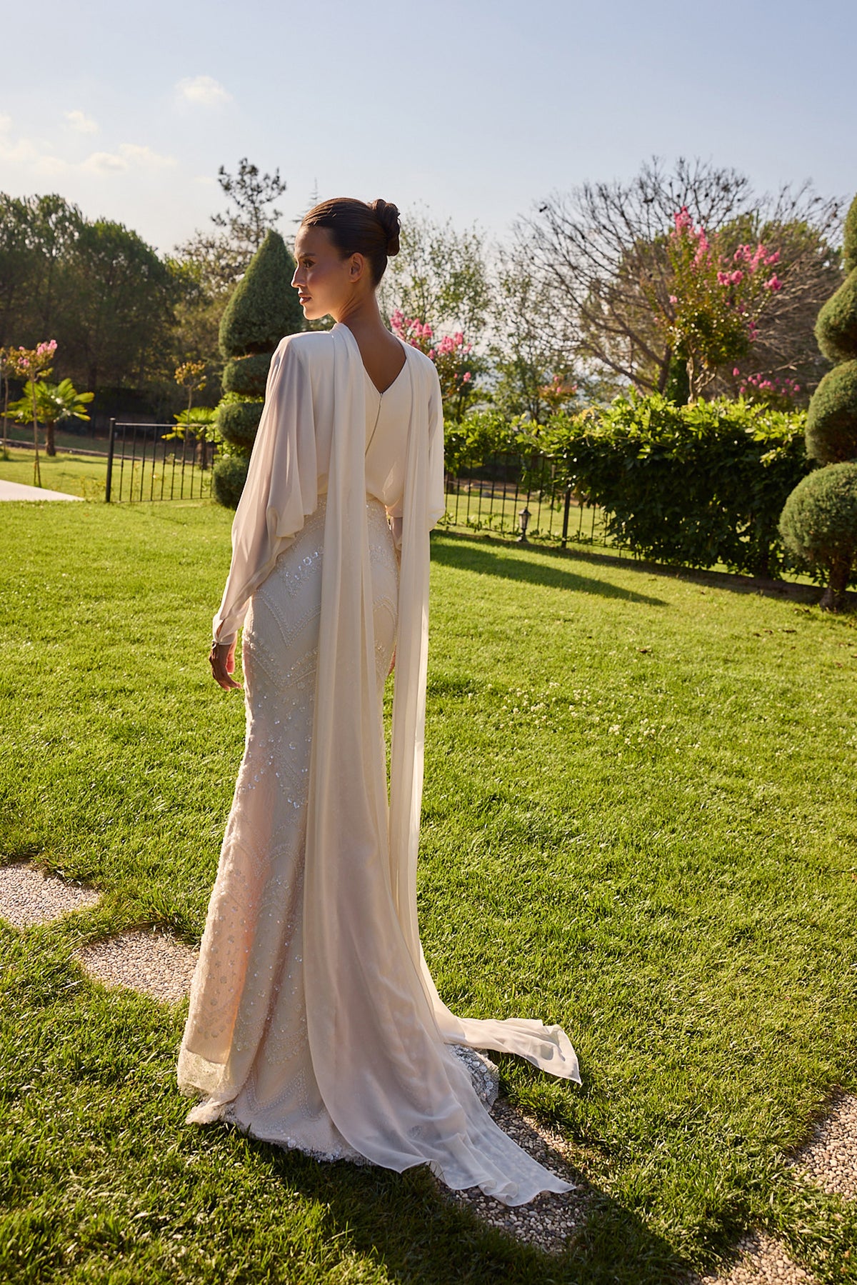 Serenelle Ivory Draped Cape Embellished Gown