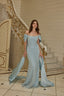 Elegant embellished evening gown in ice blue with refined couture detailing