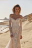 White lace long sleeve wedding dress with off shoulder detail and refined bridal elegance
