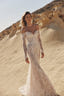 White modest couture bridal gown with lace detailing and elegant structured silhouette by Maison Harleen